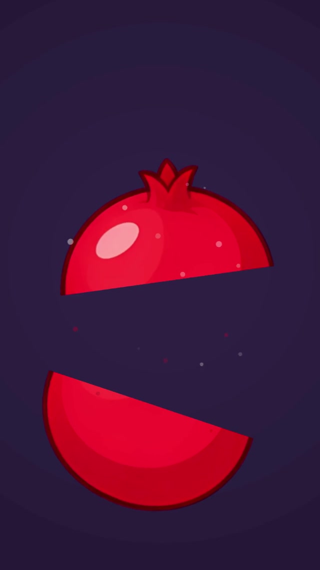 Fruit Slice mid-cut: a painted pomegranate split in two by a near-horizontal line, with the halves moving apart and juice particles around them.